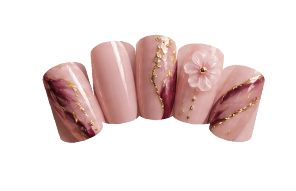Blush pink manicure with burgundy marbling, fine gold veins and a raised floral accent