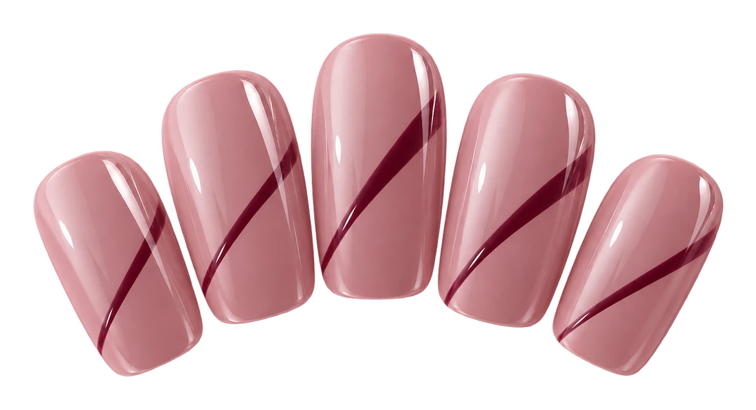 Five blush pink nails with burgundy diagonal nail art