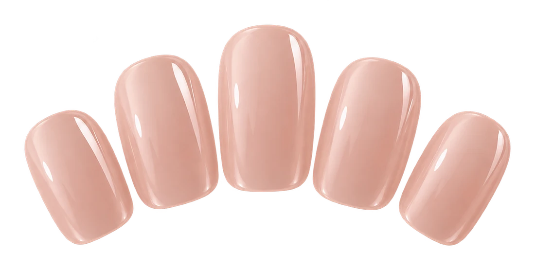 Five short natural nude nails with a sheer glossy finish